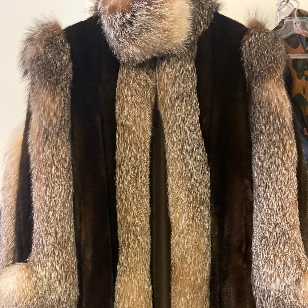 Tuxedo fox fur with mink sleeves.